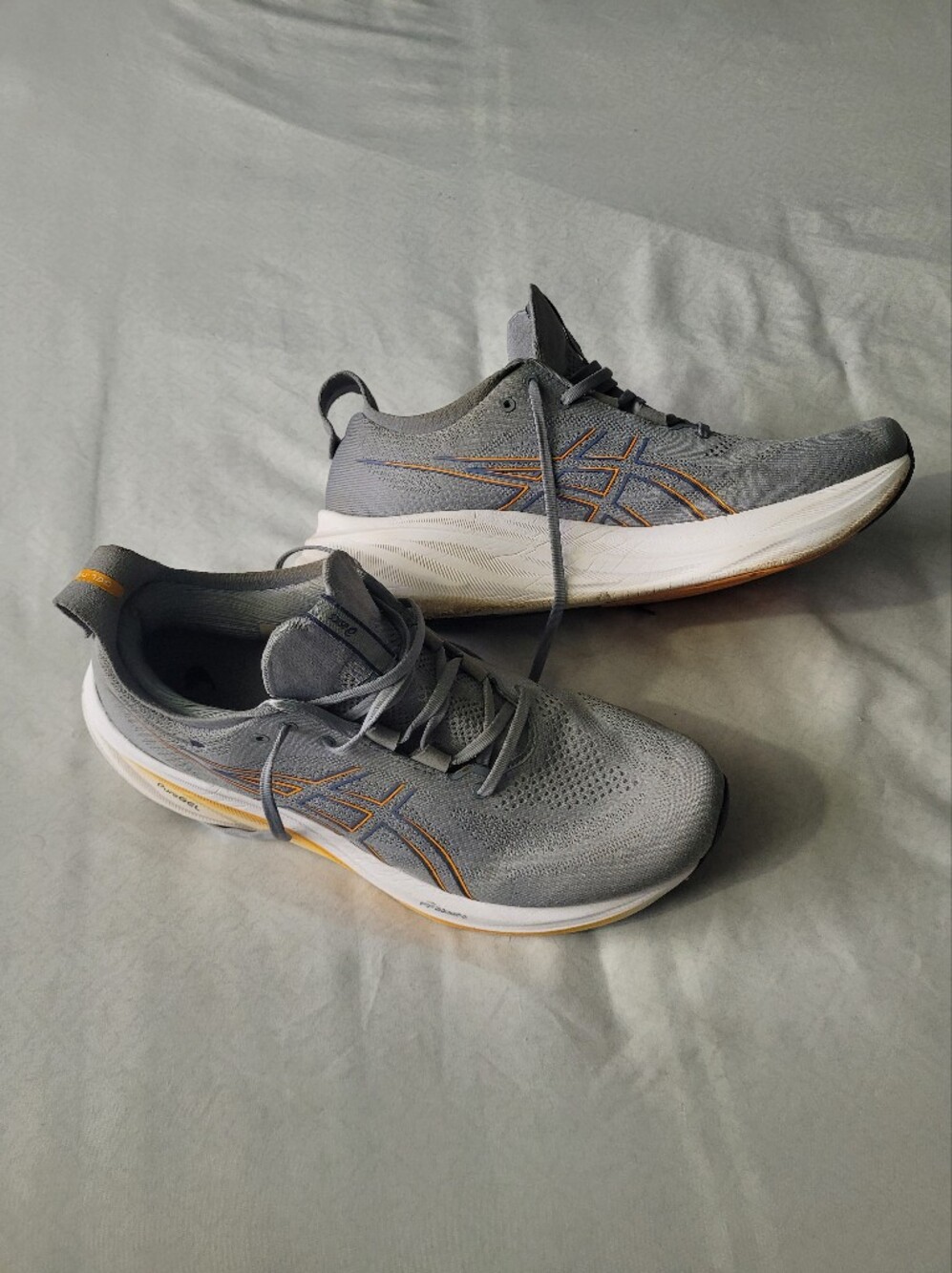 Asics Gray Athletic Running Shoes with Orange Accents